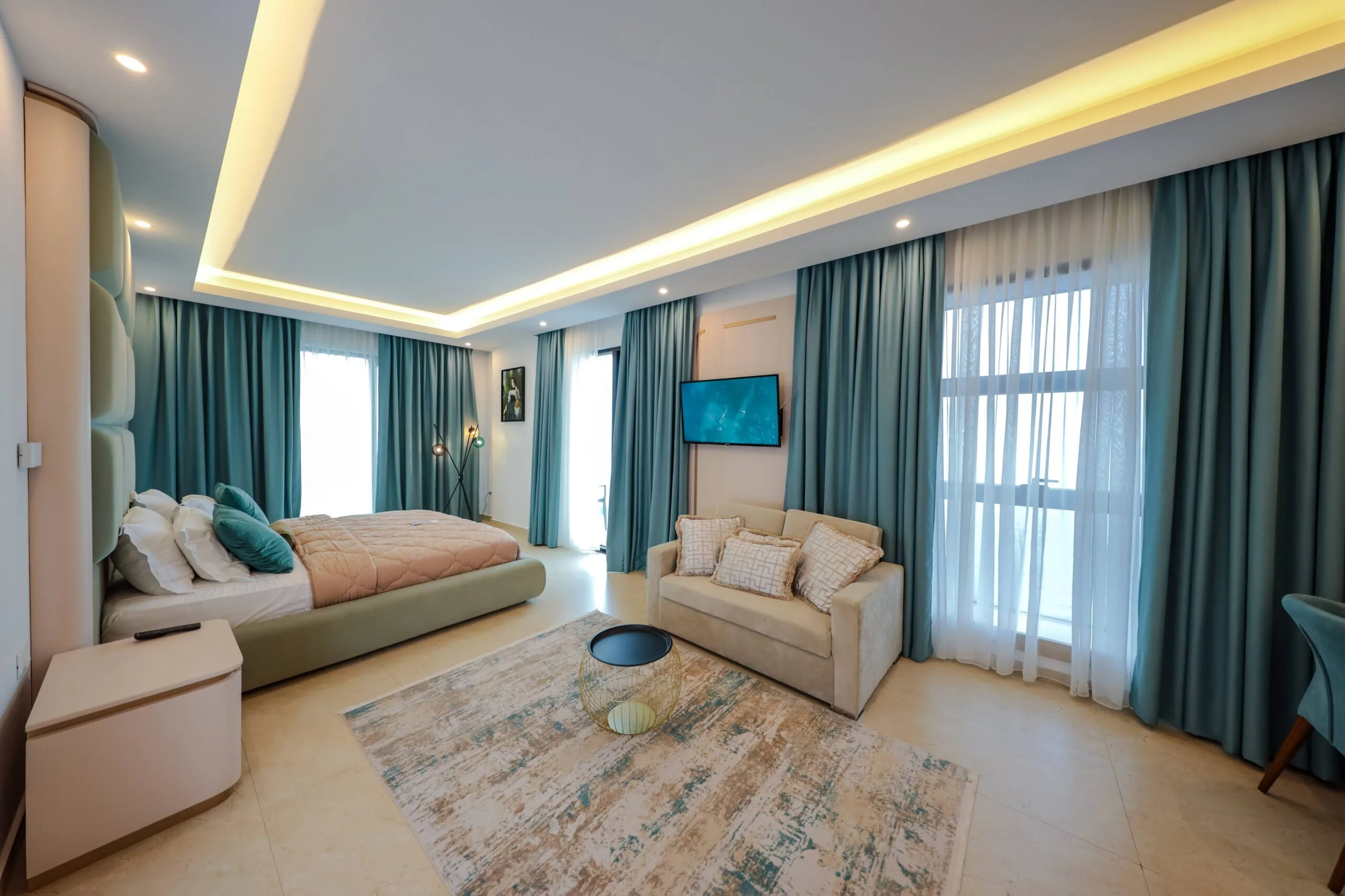 Deluxe Suite interior at Tanushaj Beach Resort — spacious room for 4 guests with balcony, Shëngjin Albania